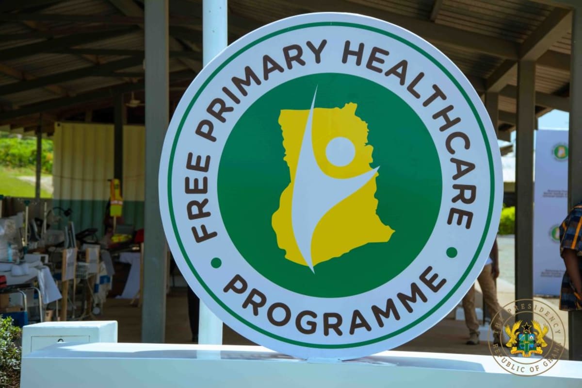 Healthcare workers providing medical care at rural clinic in Ghana community setting
