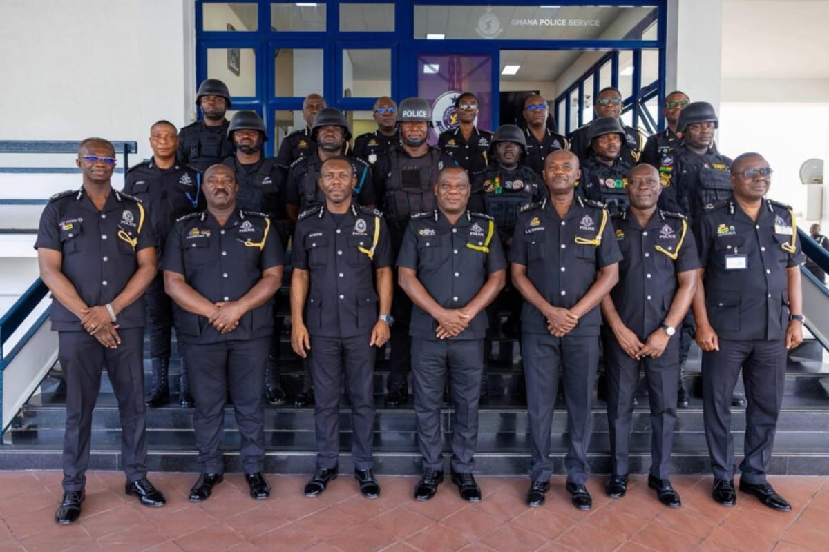 Ghana police officers standing at attention during promotion ceremony in Tema Regional Command