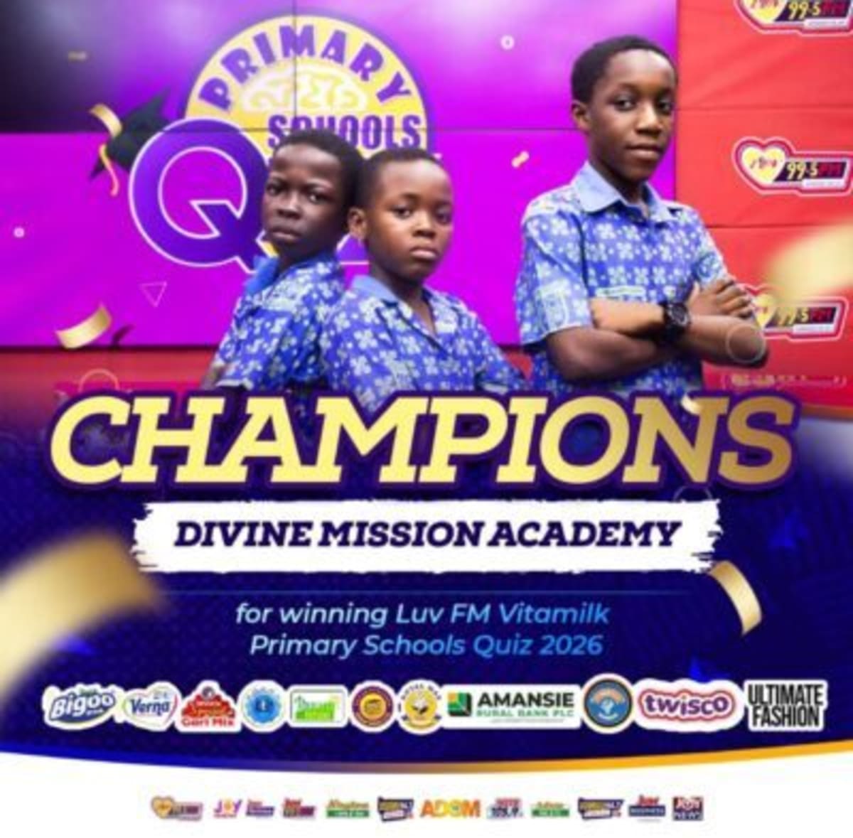 Young Ghanaian students from Divine Mission Academy celebrate their quiz championship victory with trophy
