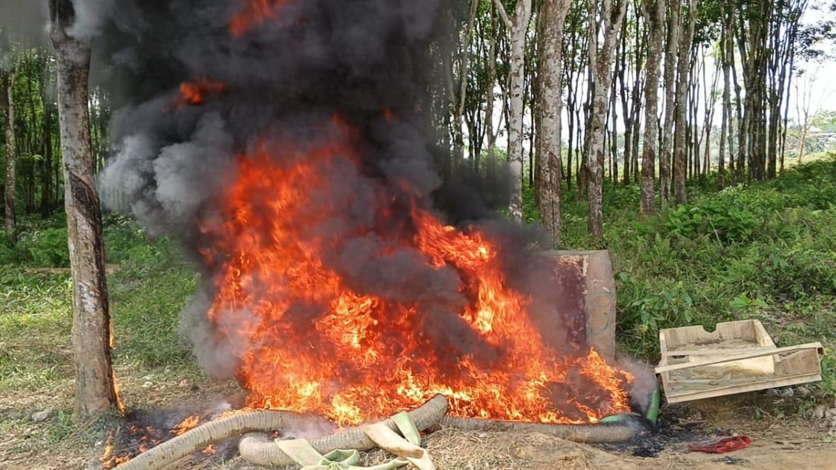 Task force boat patrol on river during anti-illegal mining operation in Ghana
