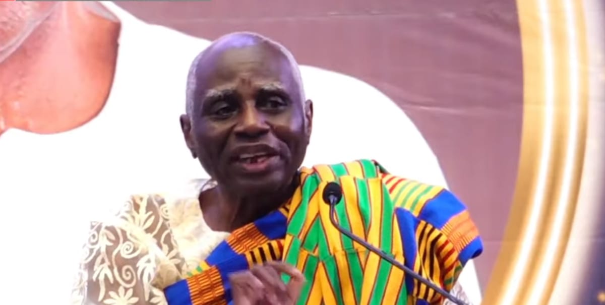 Tsatsu Tsikata speaking at podium during University of Professional Studies honor ceremony in Ghana