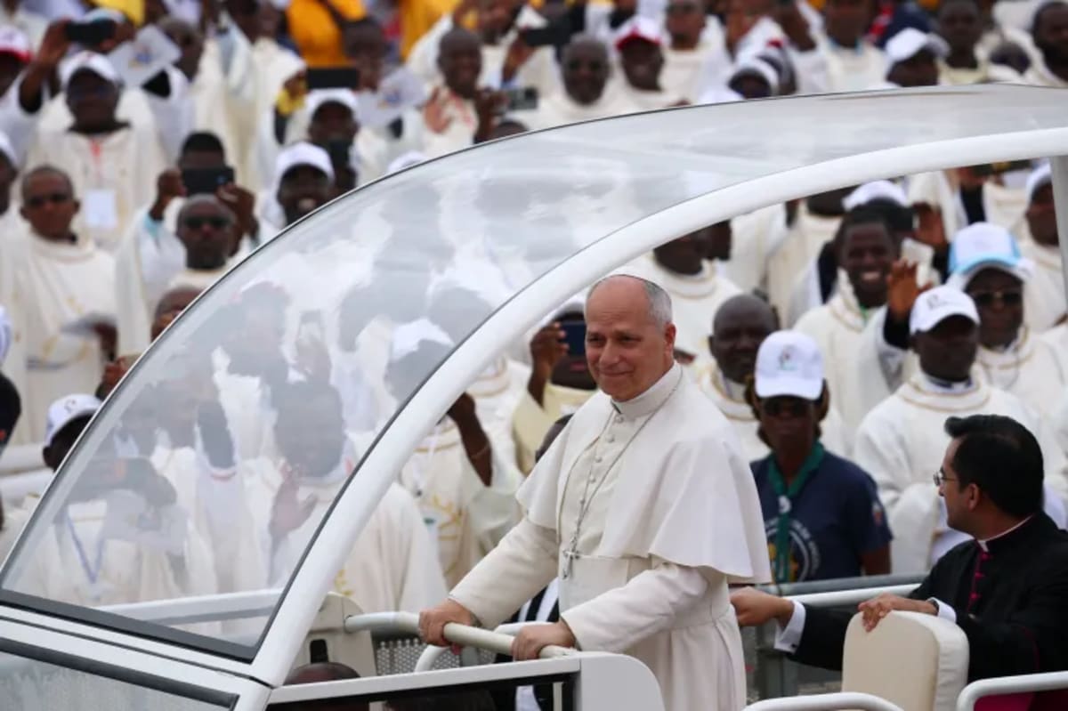Pope Leo XIV addressing massive crowd at outdoor Mass in Kilamba Angola