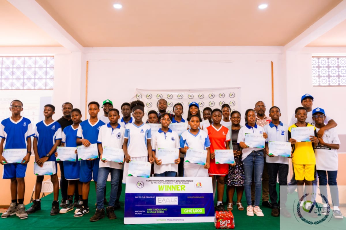 Young Ghanaian female students celebrating their constitutional literacy quiz victory at school