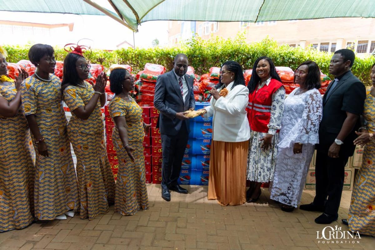 Young Ghanaian women gathered at church rally receiving empowerment message about personal growth