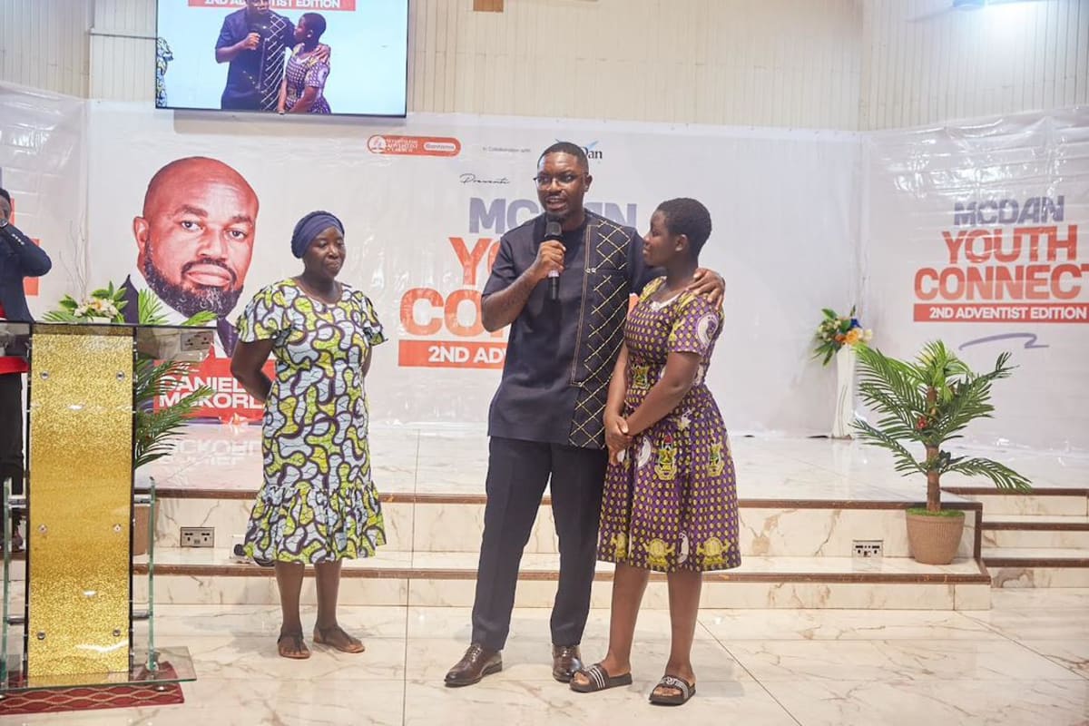Young Ghanaian student in school uniform presenting business pitch at youth entrepreneurship competition