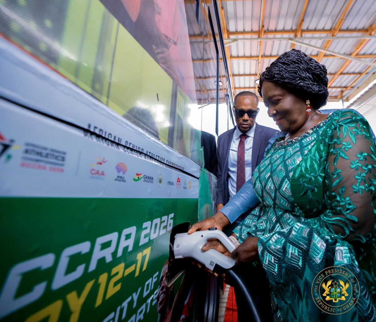 Row of new white Metro Mass Transit buses lined up at commissioning ceremony in Ghana