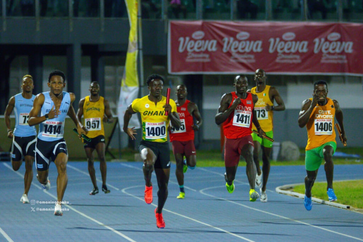 Ghanaian athletes celebrating with medals at African Seniors Athletics Championships in Accra