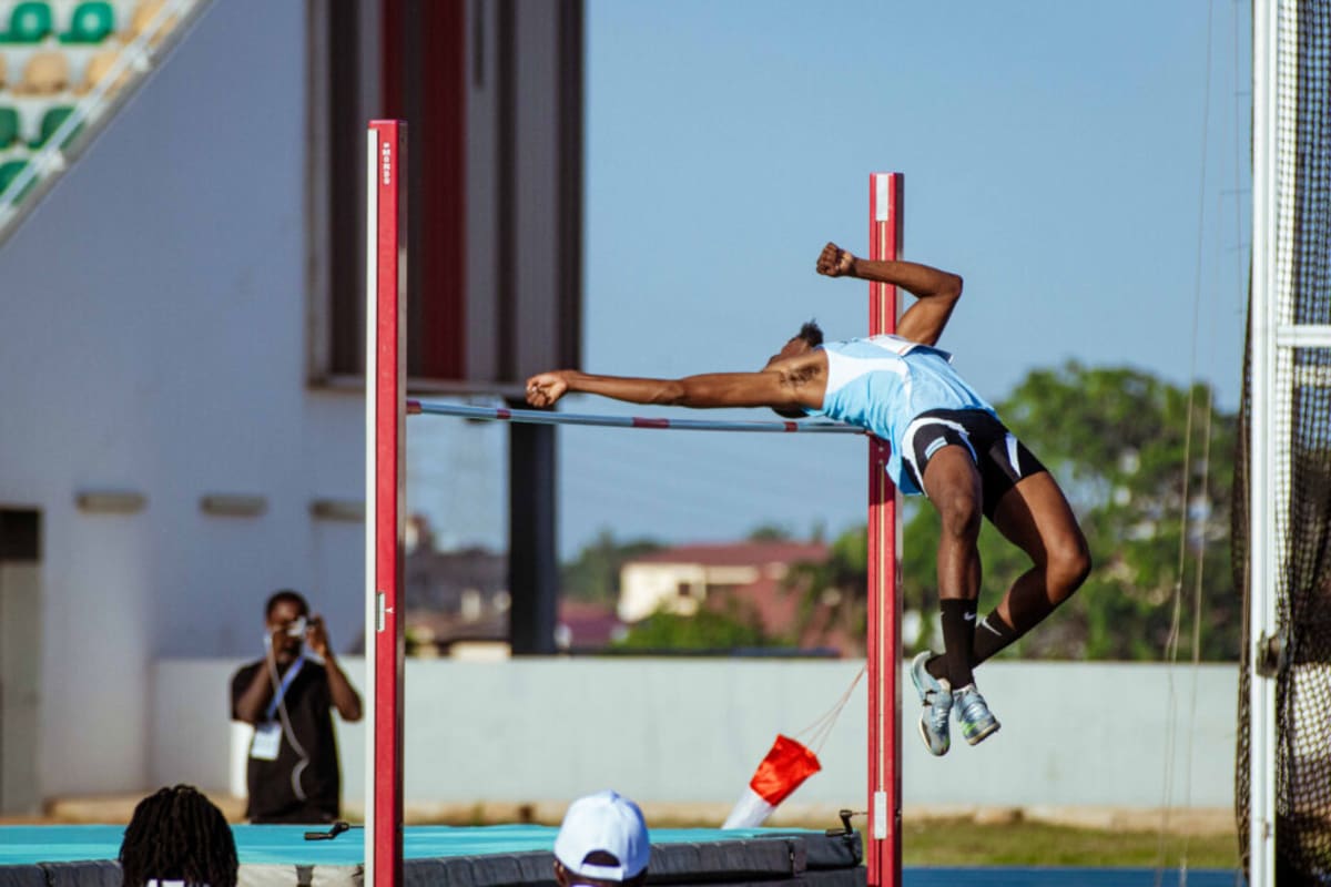 Athletes competing on track at University of Ghana Stadium during African Athletics Championships opening day