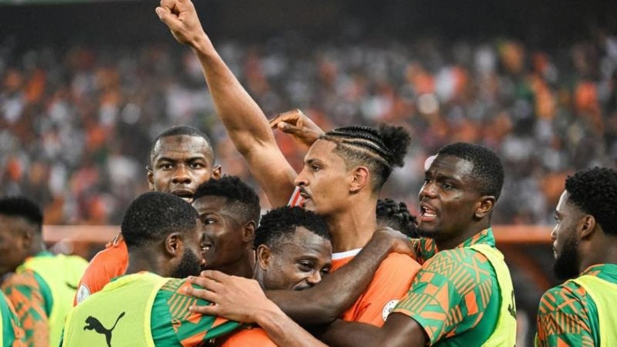 Ivory Coast national football team celebrating with AFCON trophy after dramatic tournament comeback victory
