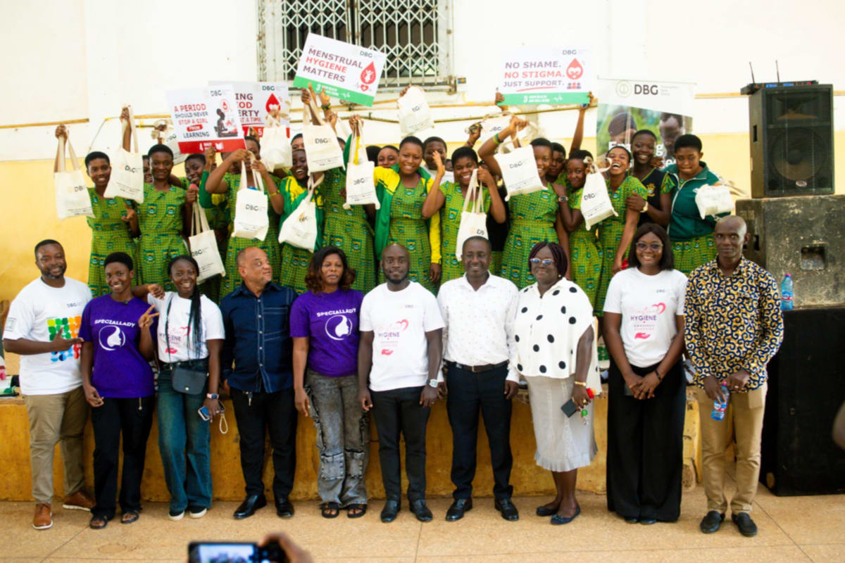 Students at Ghana high school receiving menstrual hygiene education and sanitary pad donations from Development Bank