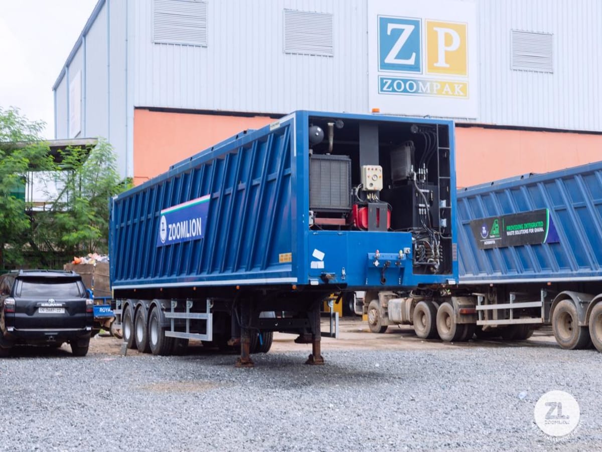 Waste transfer station facility in Ghana where tricycle collectors deposit garbage for processing
