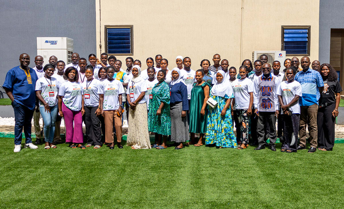 Young Ghanaian farmers learning greenhouse vegetable production techniques at KNUST training facility