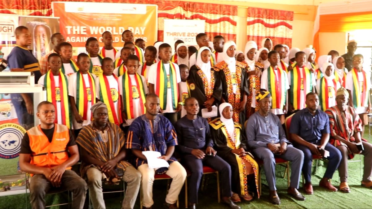 Young Ghanaian students in parliamentary session learning democratic advocacy and child protection