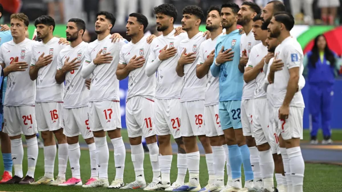 Handwritten peace message in Persian and English left by Iran's soccer team in locker room