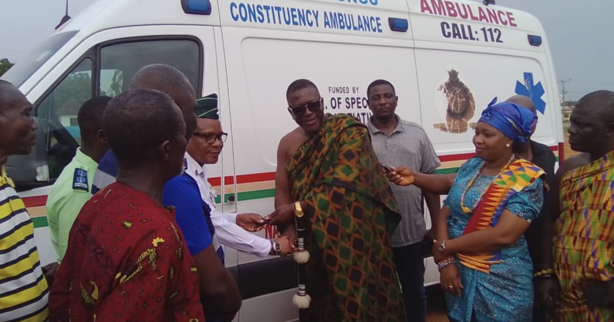 Restored white ambulance with red markings stands ready for emergency service in Adidome, Ghana