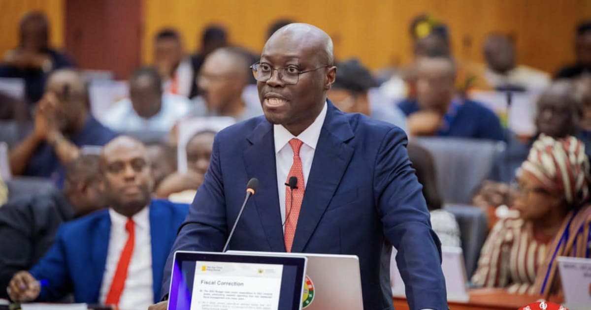 Construction workers building new highway connecting Ghanaian cities under infrastructure program