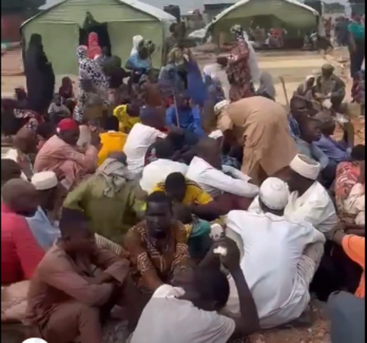 Ghana Immigration Service officers assisting vulnerable migrants during humanitarian repatriation operation in Accra