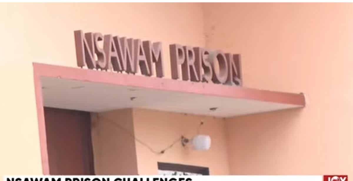 Classroom interior at Nsawam Medium Security Prison in Ghana with desks and educational materials