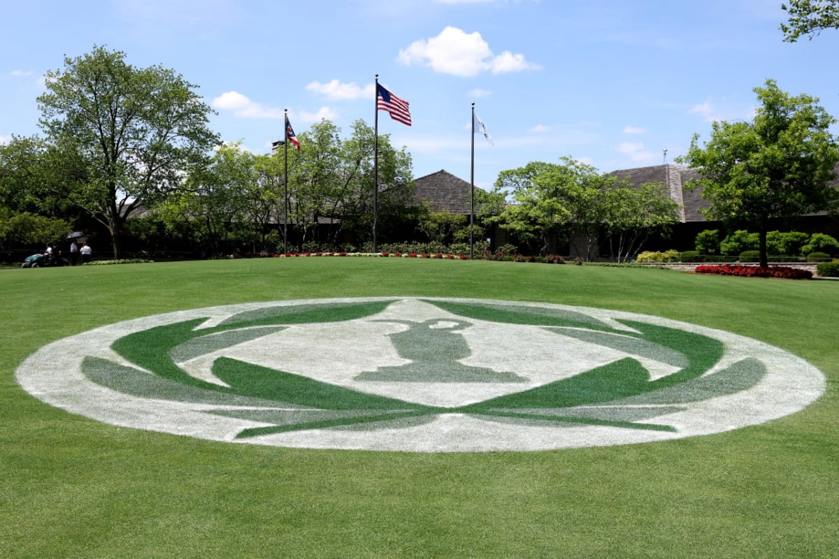** Young boy Will Nirote smiling at Muirfield Village Golf Club during Memorial Tournament Golden Cubs celebration