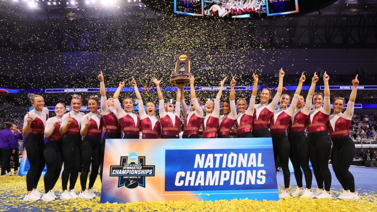 Oklahoma Sooners women's gymnastics team celebrating their 2026 NCAA national championship victory in Fort Worth