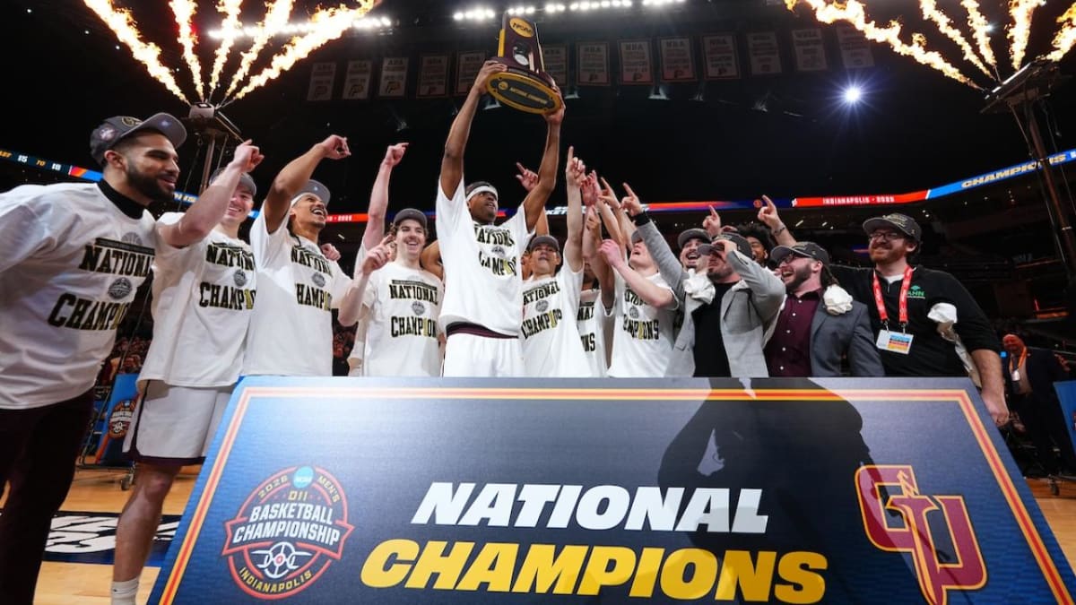 ** Gannon University basketball players celebrating their first Division II national championship victory in Indianapolis