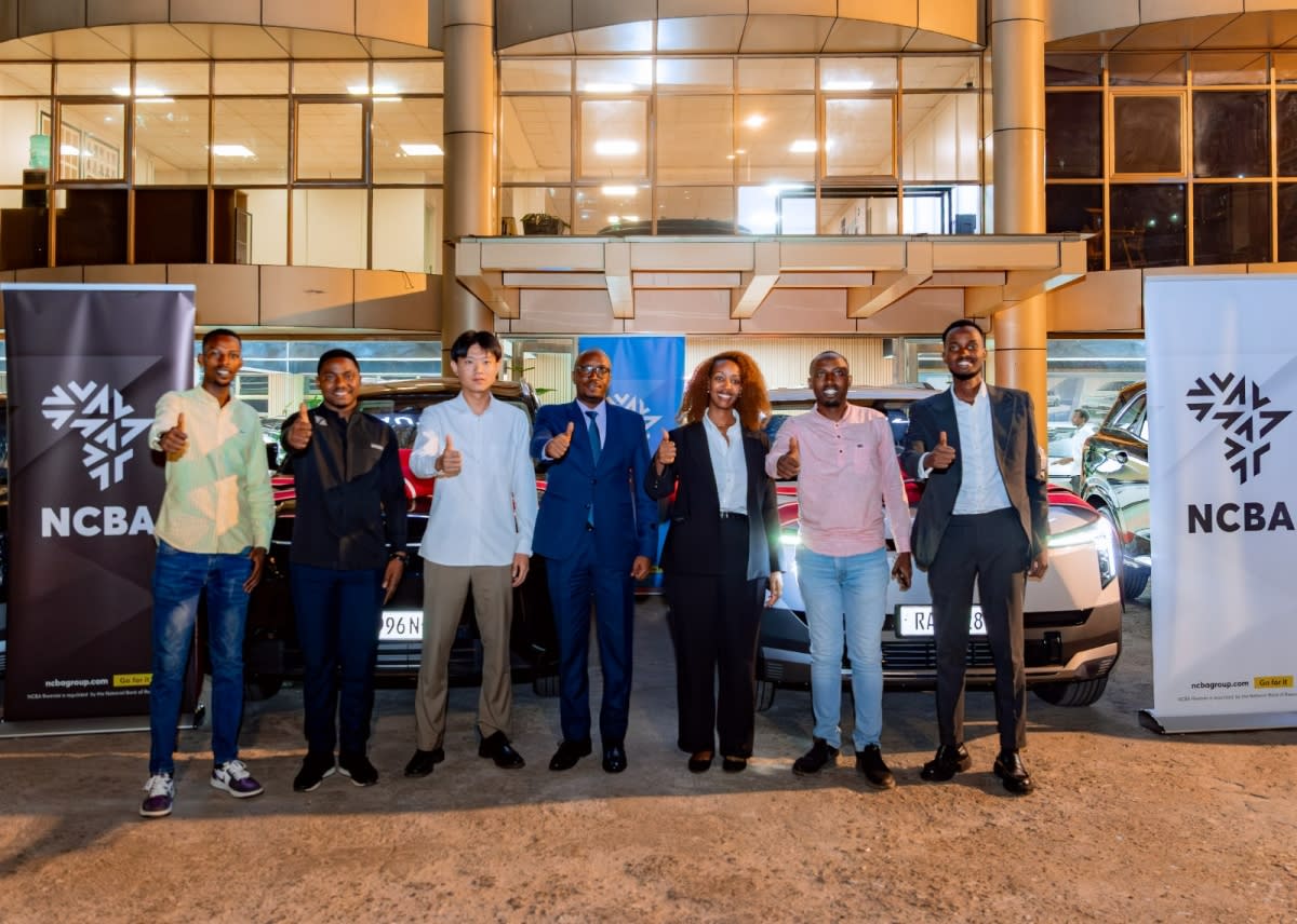 New electric vehicle owners receive keys during handover ceremony in Rwanda