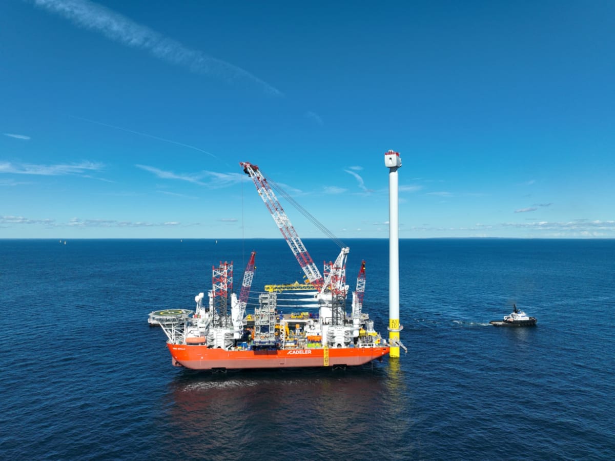 Large offshore wind turbine being installed in ocean waters off New York coast