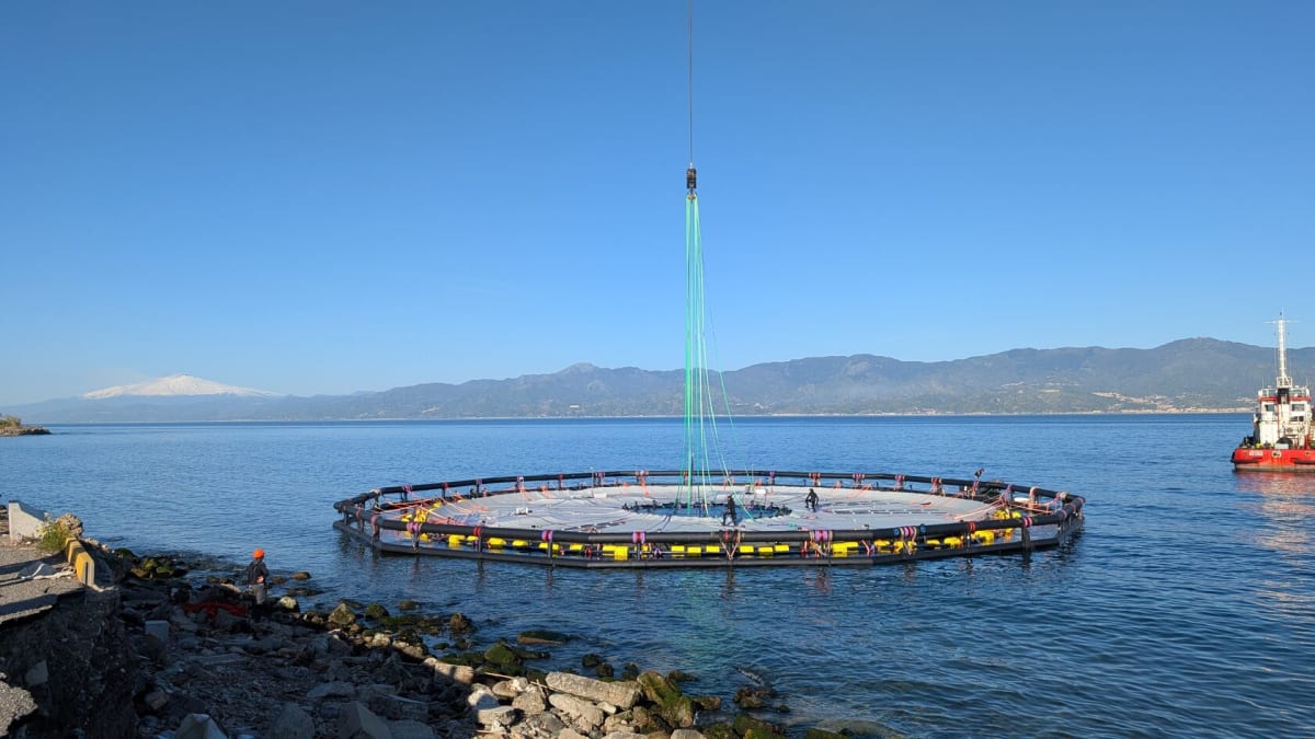 Large floating circular reservoir being installed in ocean waters off Italian coast for renewable energy storage