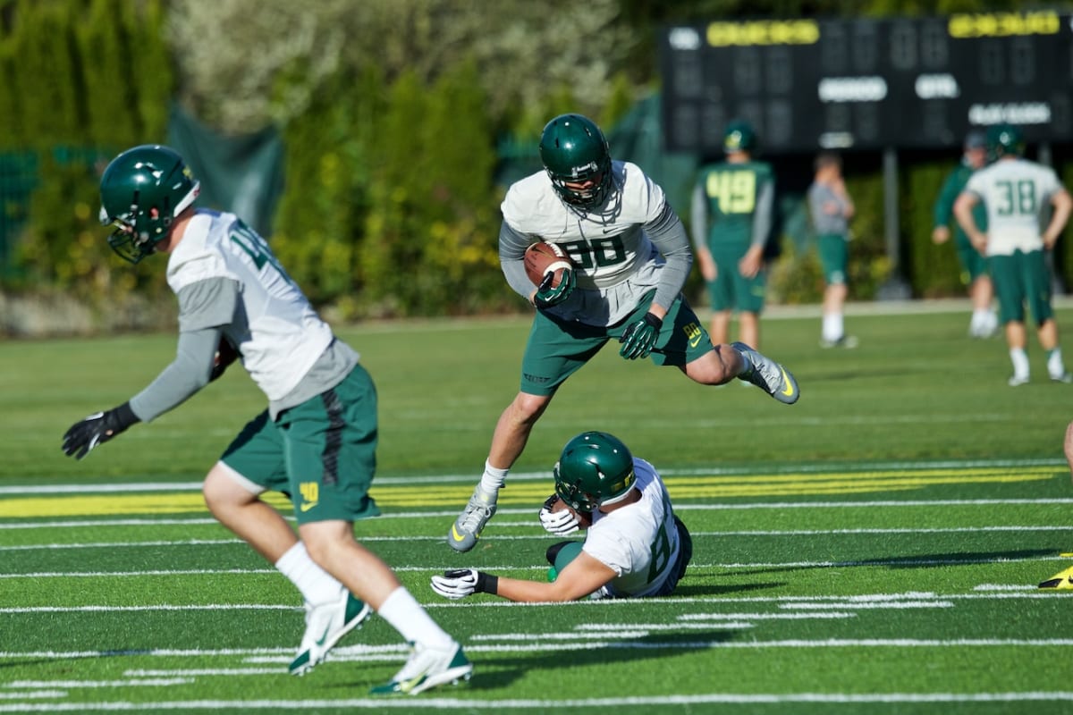 Oregon Ducks quarterback coach Koa Ka'ai on sideline during spring practice at Autzen Stadium