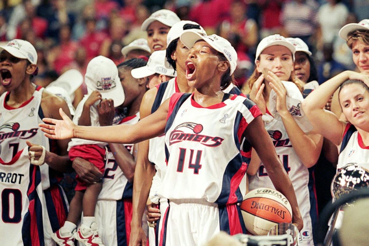 Tilman Fertitta smiling in business attire, bringing WNBA basketball back to Houston