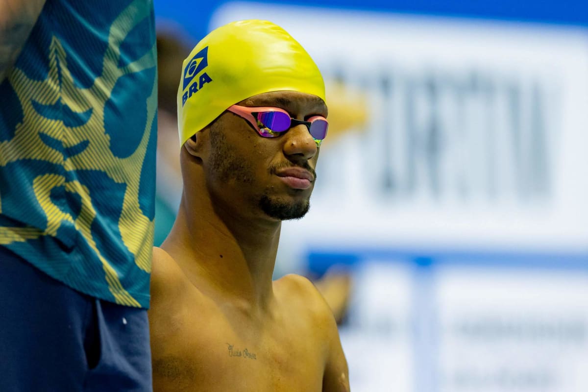 Brazilian Paralympic swimmer Gabriel Araujo celebrating with dance moves after winning gold medal in Berlin pool