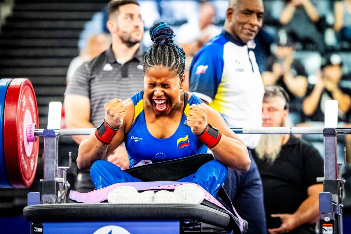 Venezuelan para powerlifter Clara Fuentes competing at Paralympic games with focused expression