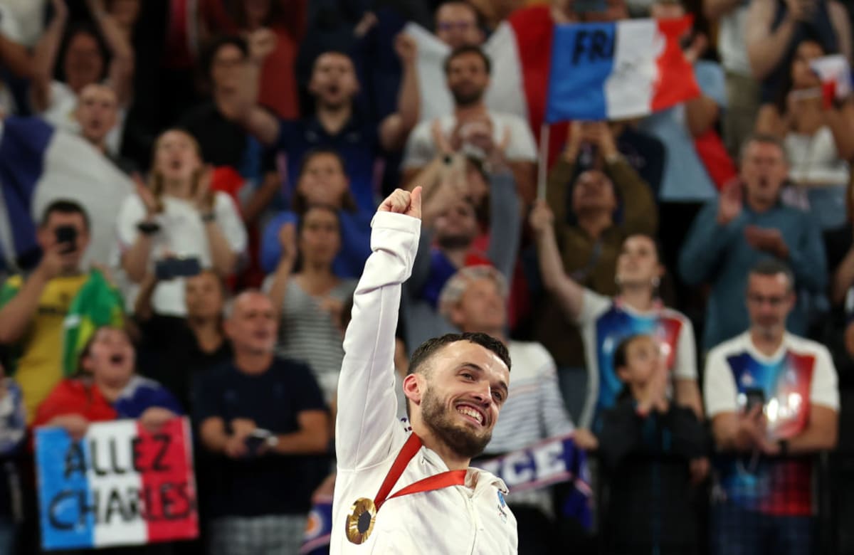 Charles Noakes celebrates winning Paralympic gold medal in Para badminton at Paris 2024