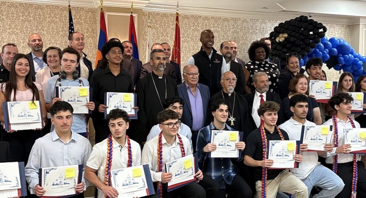 Armenian high school graduates in caps and gowns with heritage stoles at Pasadena celebration