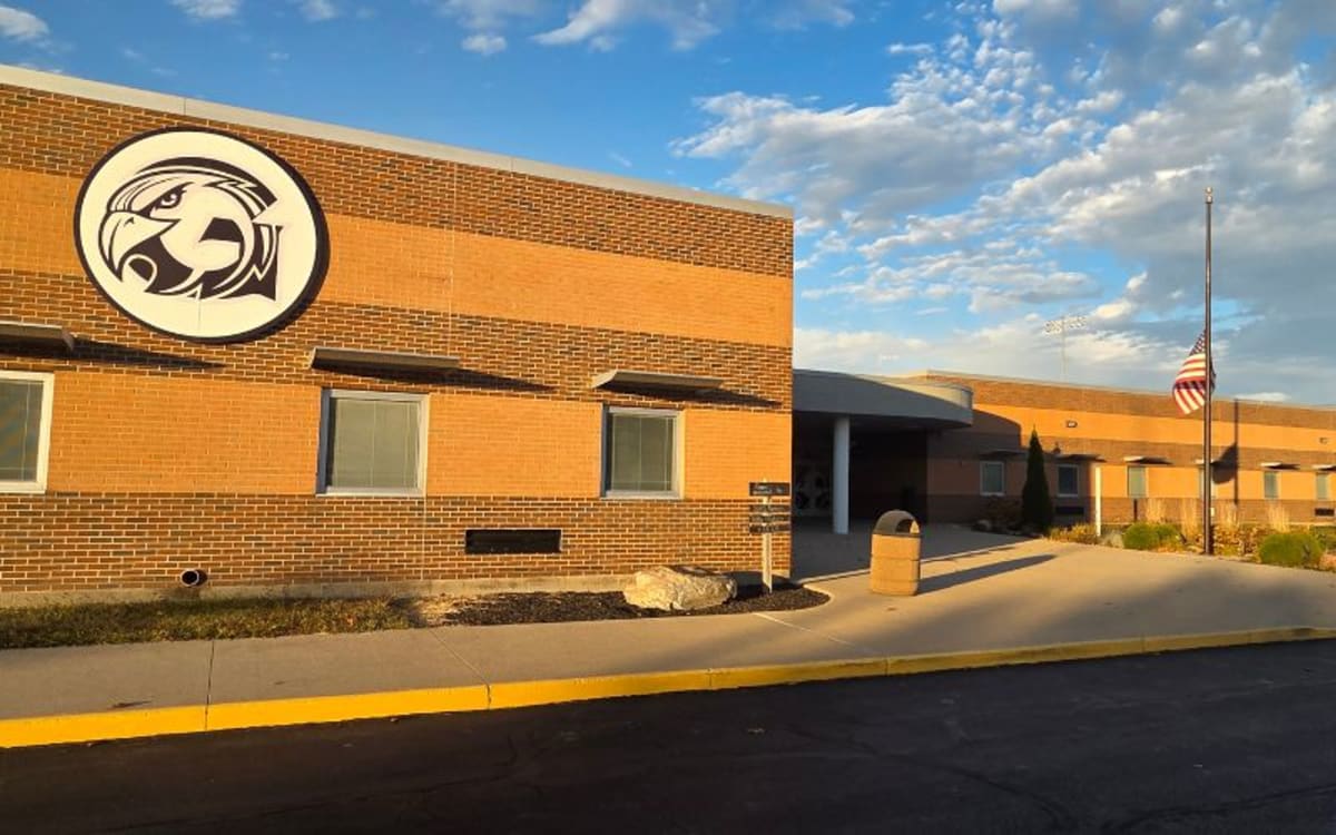 Graham Local Schools building exterior with welcome sign showing Ohio state recognition awards