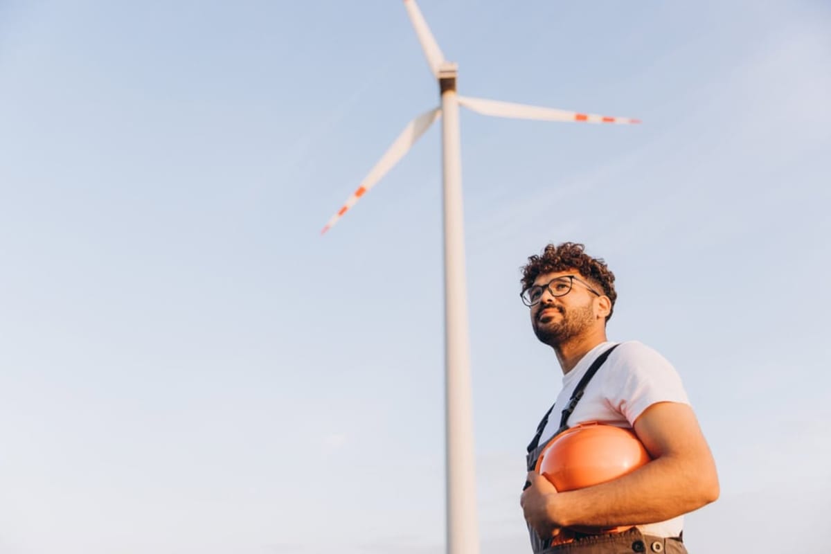 De-mining equipment in cleared Croatian countryside with green fields and blue sky