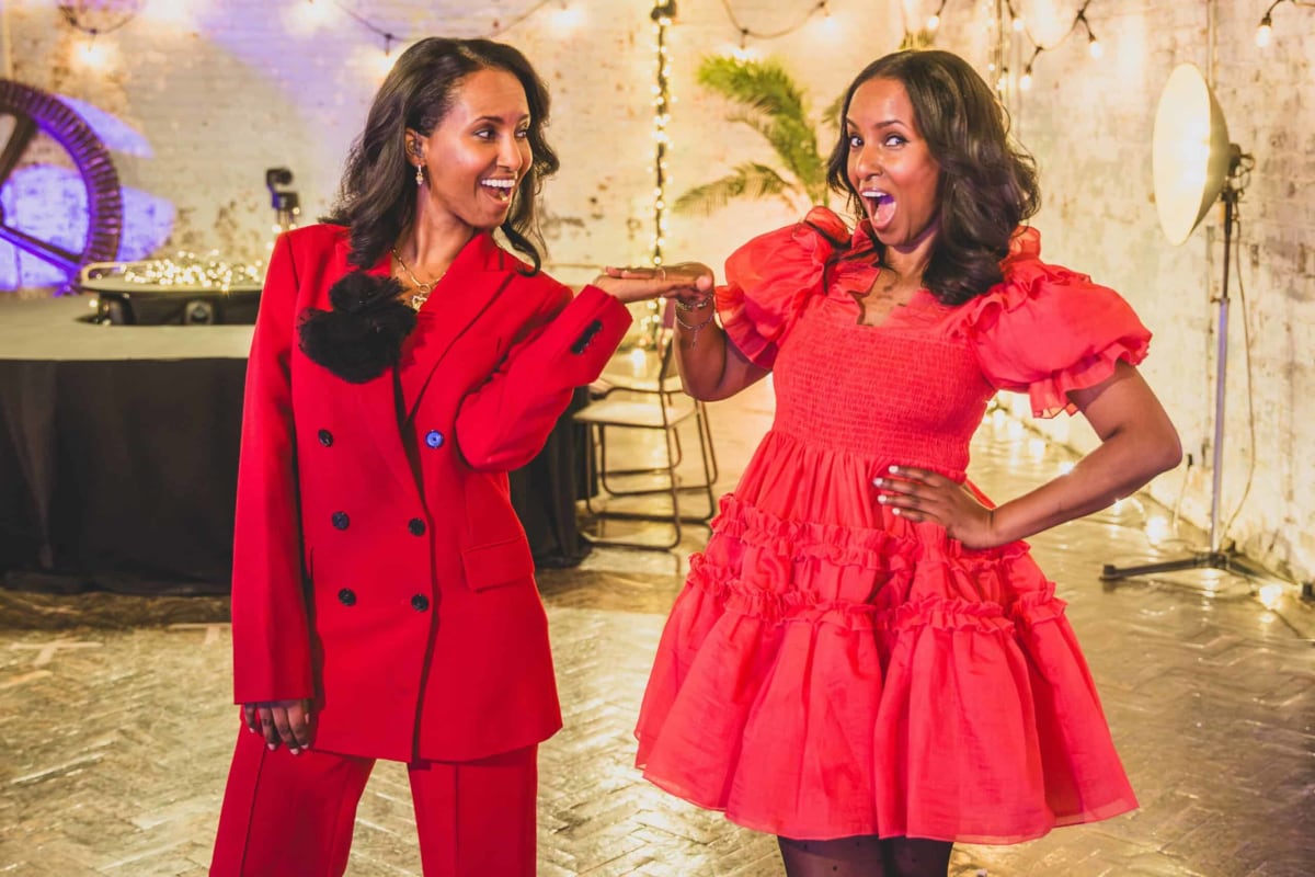 Deaf twin hosts Hermon and Heroda Berhane signing on the set of Hold My Hand dating show