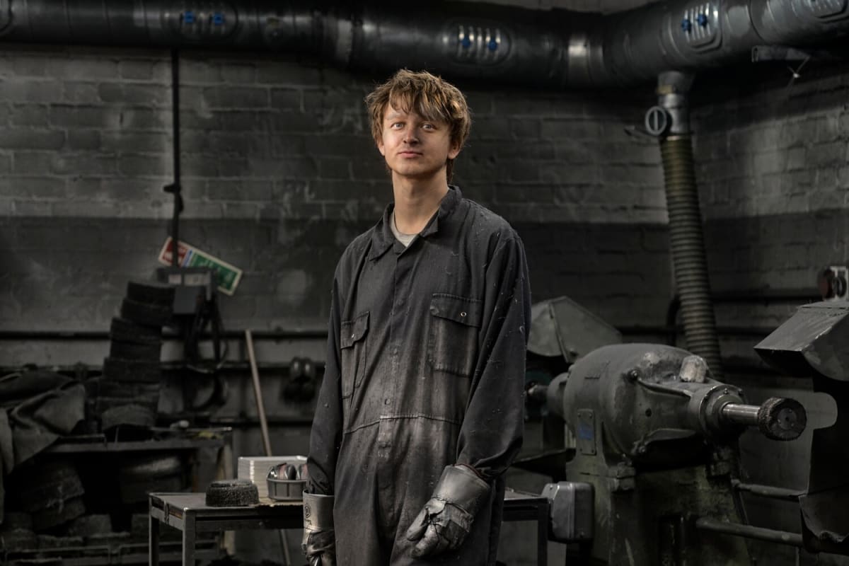Benjamin Bryde polishing aluminum trays in dusty workshop on Old Kent Road, London