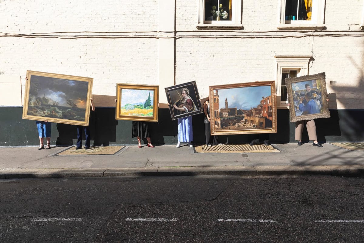 High-quality reproduction of famous National Gallery painting displayed in UK town center public space