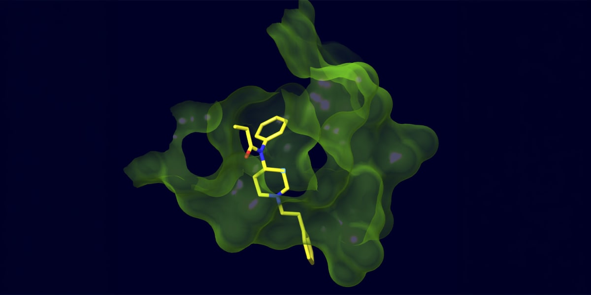 Scientists examining vaccine vials in laboratory working on breakthrough fentanyl vaccine research