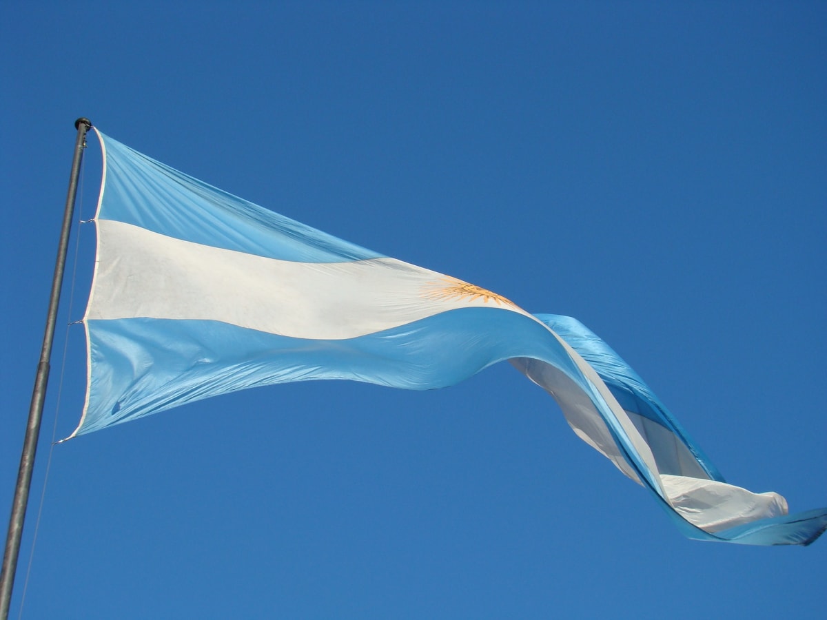 Solar panels installed on rooftop in Argentina generating clean renewable energy for local community