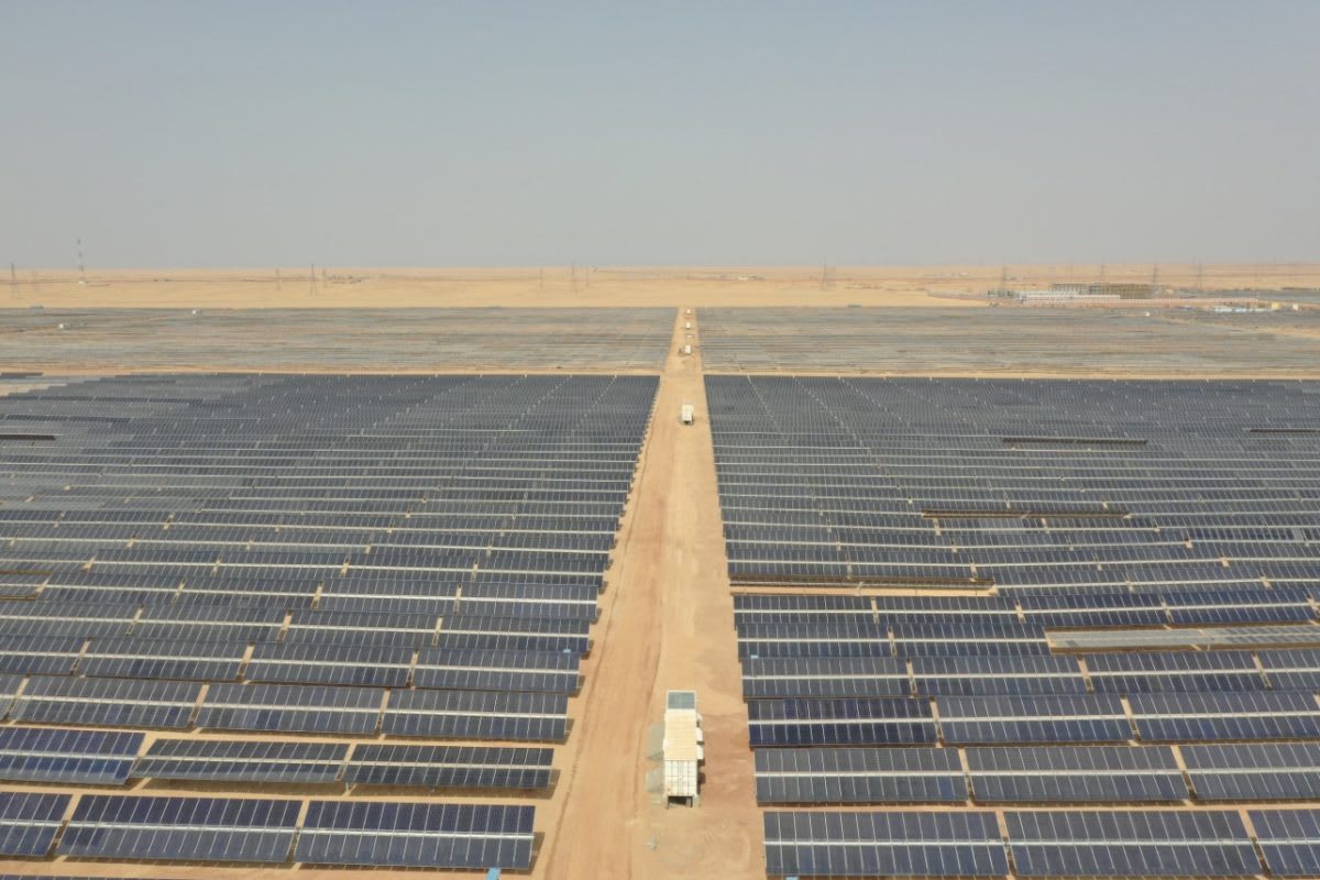 Aerial view of massive solar panel arrays at Egypt's Obelisk renewable energy facility