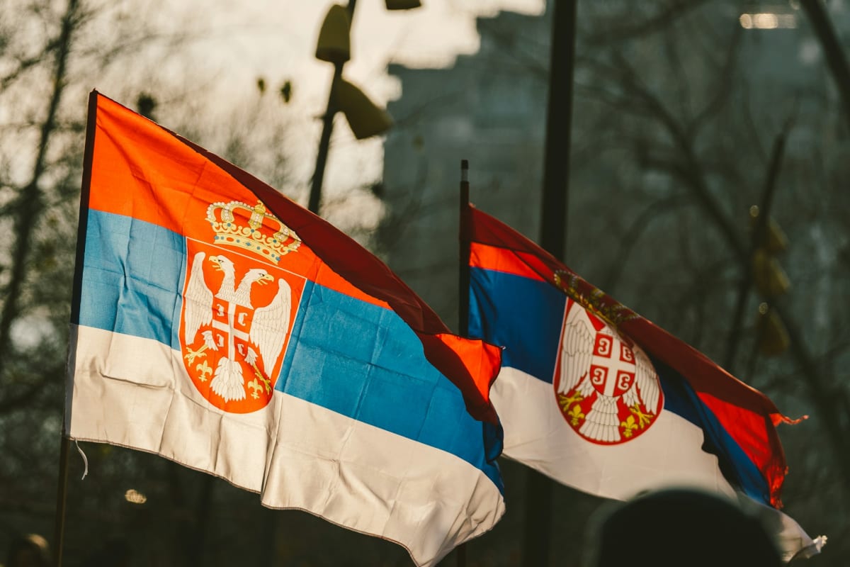 Solar panels and wind turbines generating clean renewable energy in Serbia