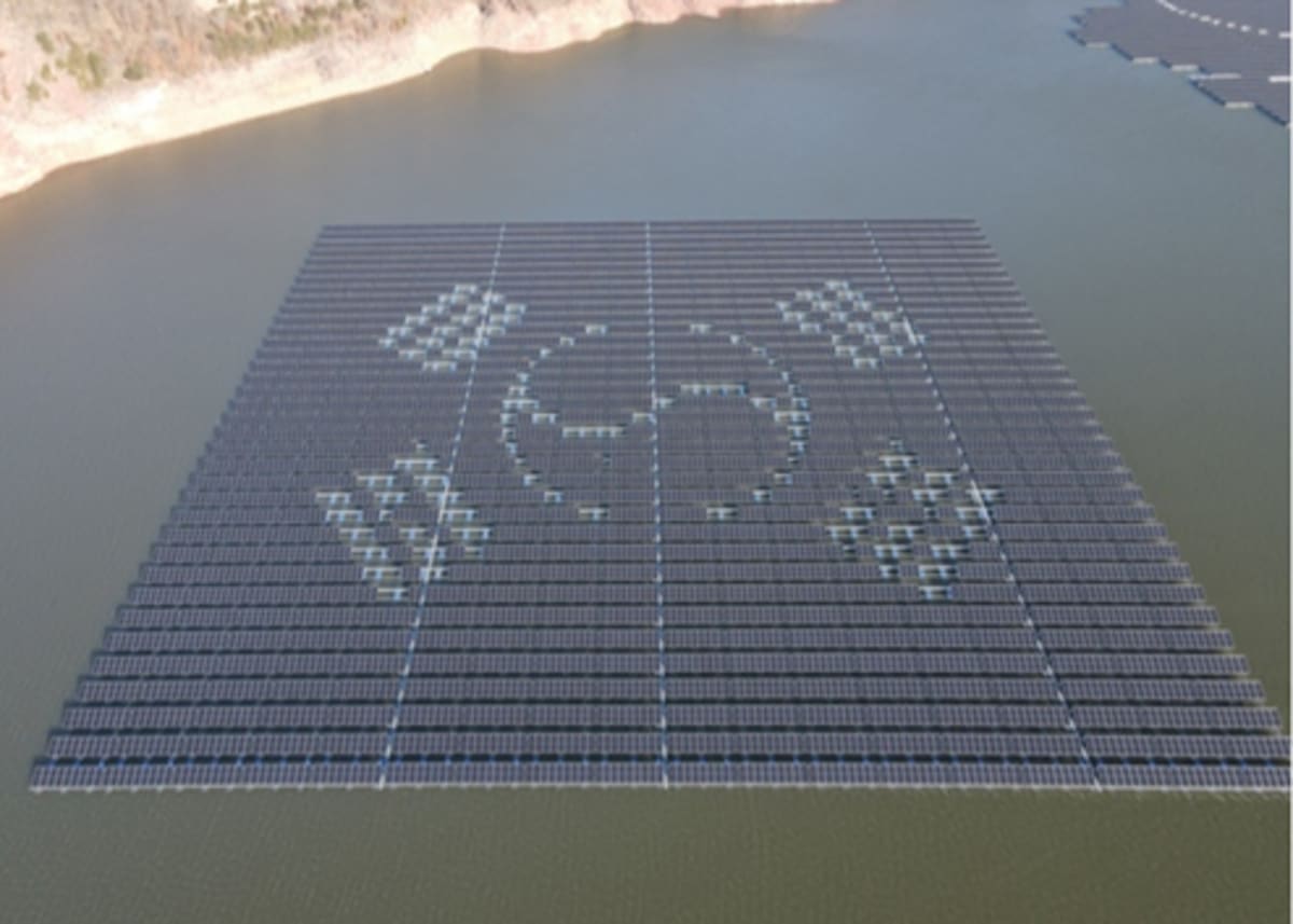 Solar panels installed across South Korean landscape with mountains in background
