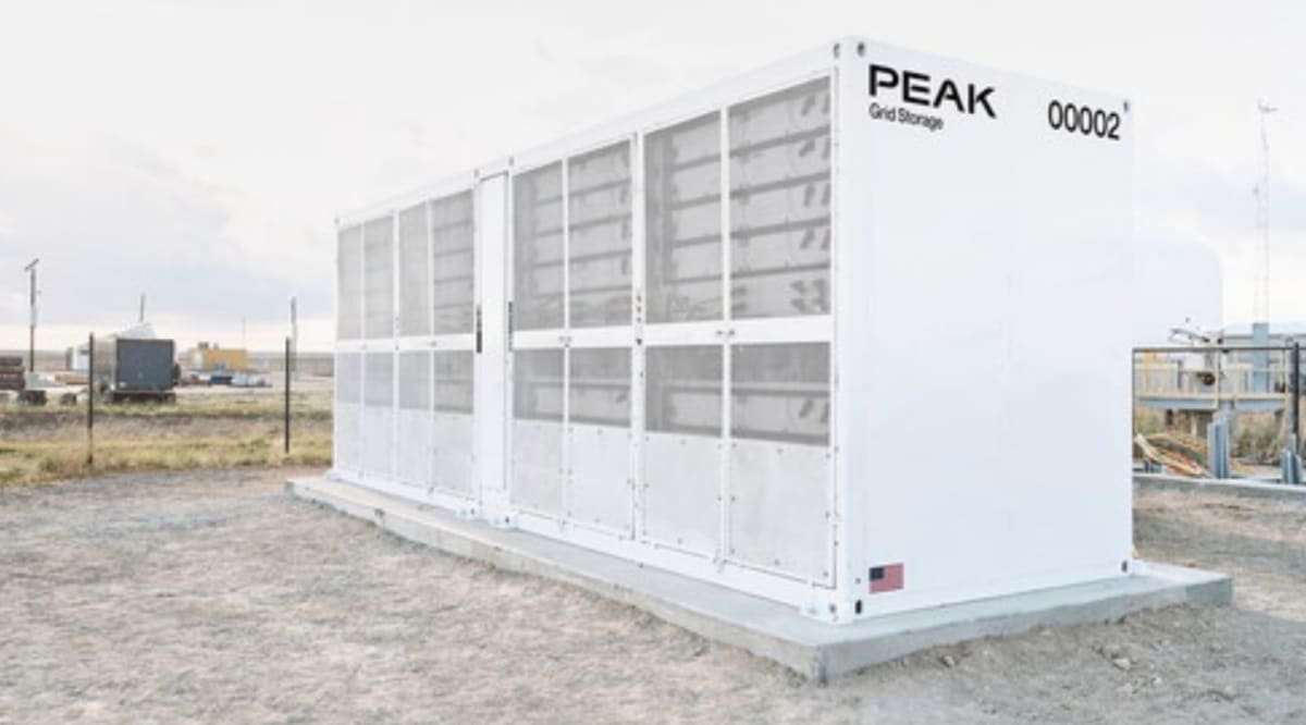 Grid-scale sodium-ion battery energy storage facility in rural Wisconsin landscape
