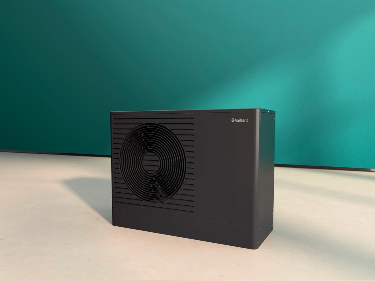 Compact white Vaillant Arotherm Pro heat pump unit mounted outdoors on building wall