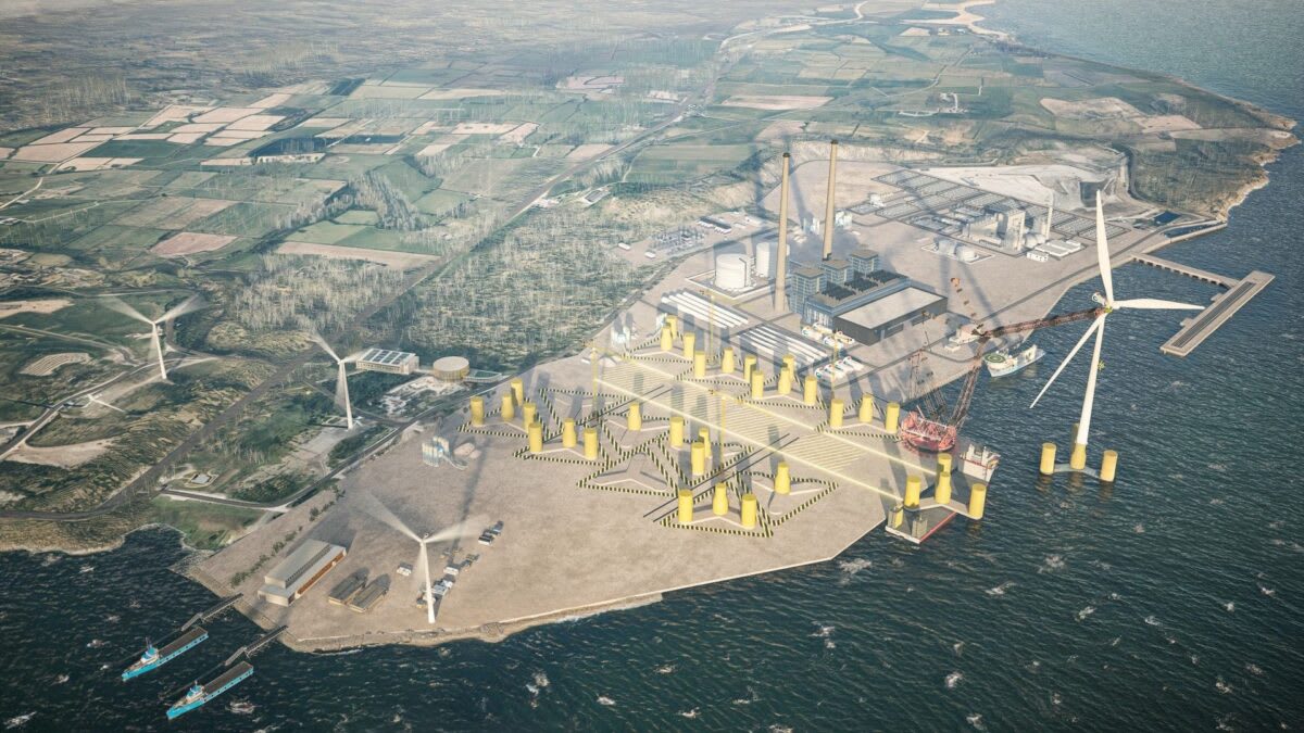 Wind turbines on green Irish hillside producing renewable energy for clean hydrogen fuel production