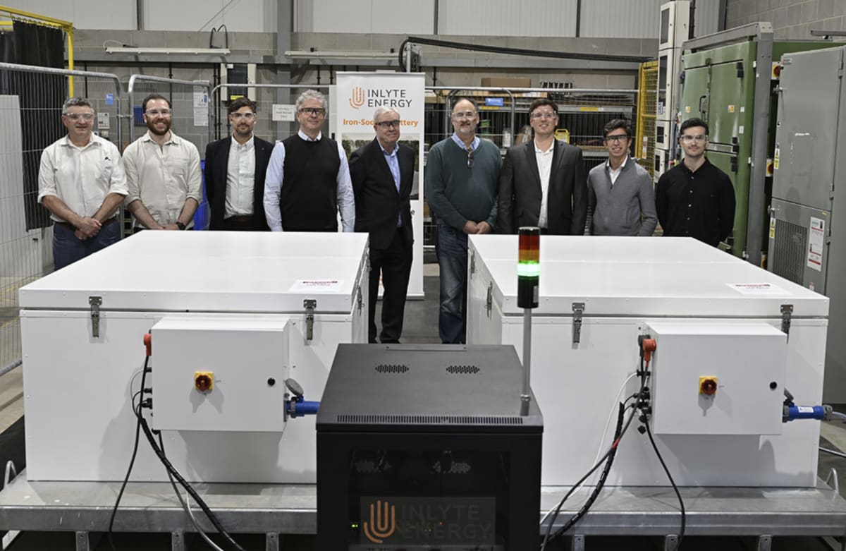 Modern battery storage system installed at industrial data center facility with server racks