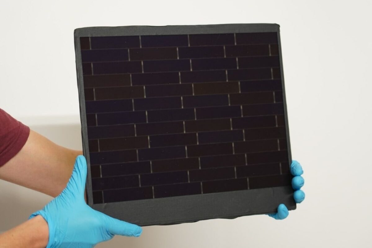 Close-up view of high-efficiency solar panel with overlapping cell pattern at German research facility