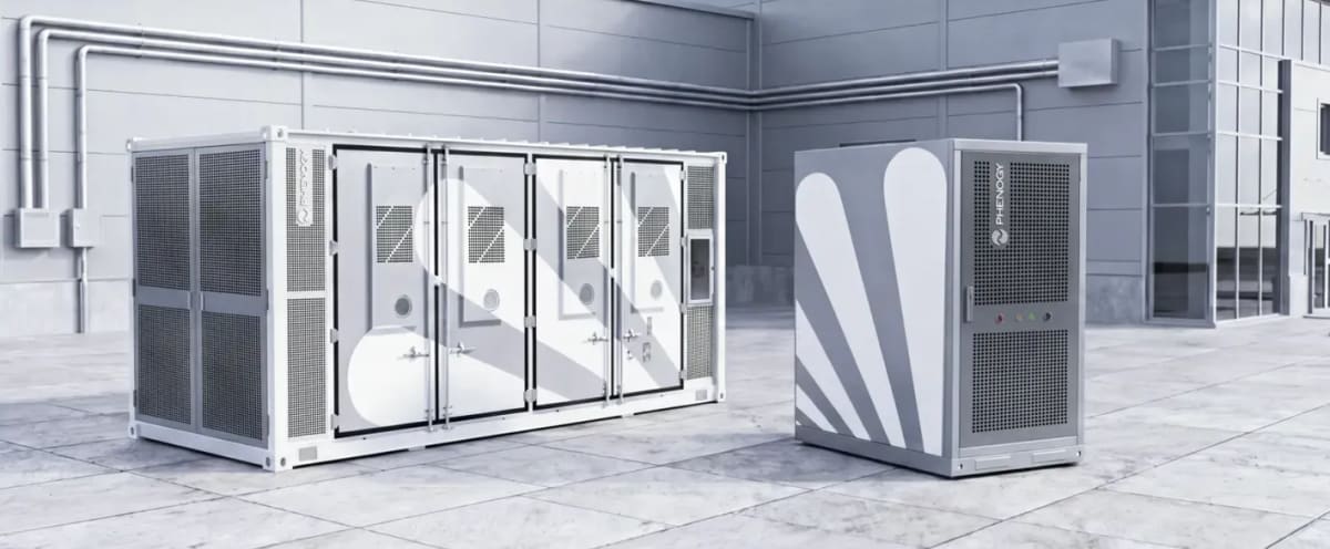 Large rectangular white battery storage unit displayed at clean energy trade show in Munich